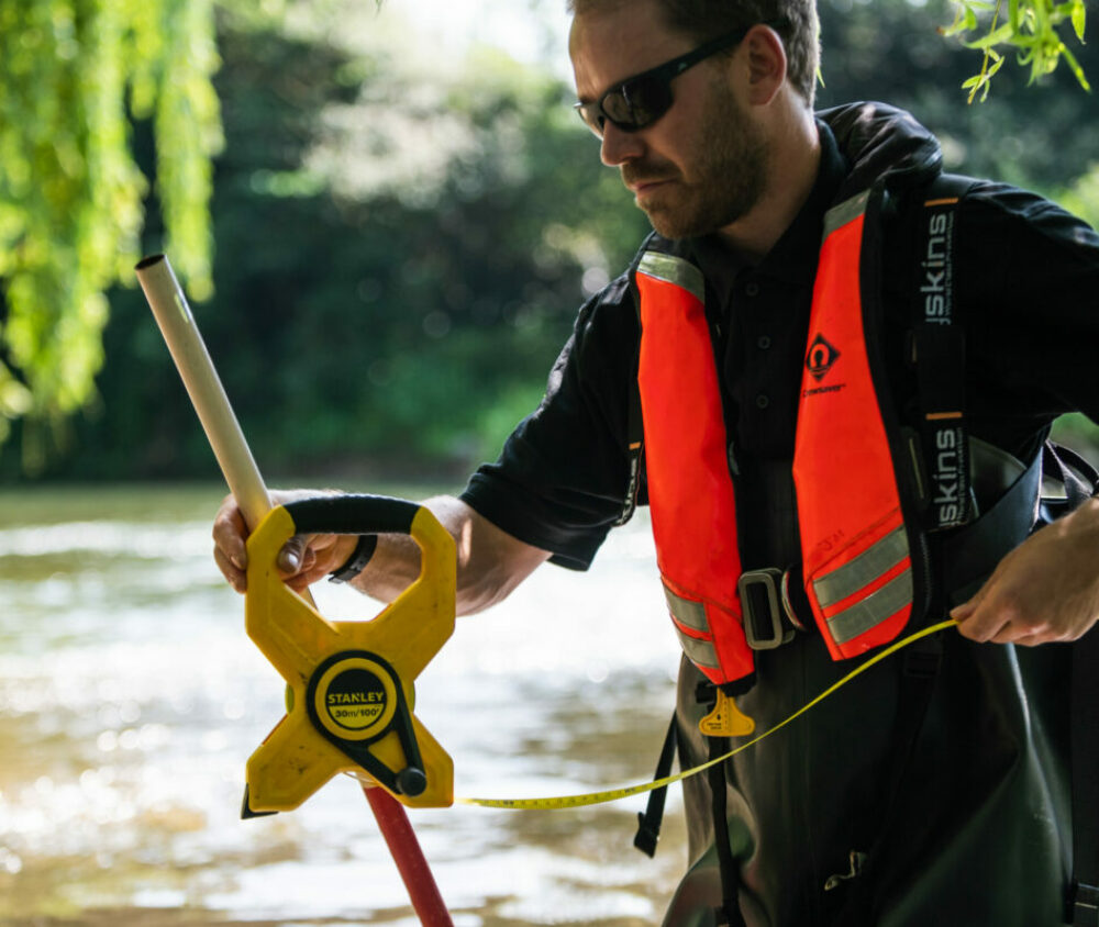 A member of the FiveRivers team during a hydrometry and telemetry project