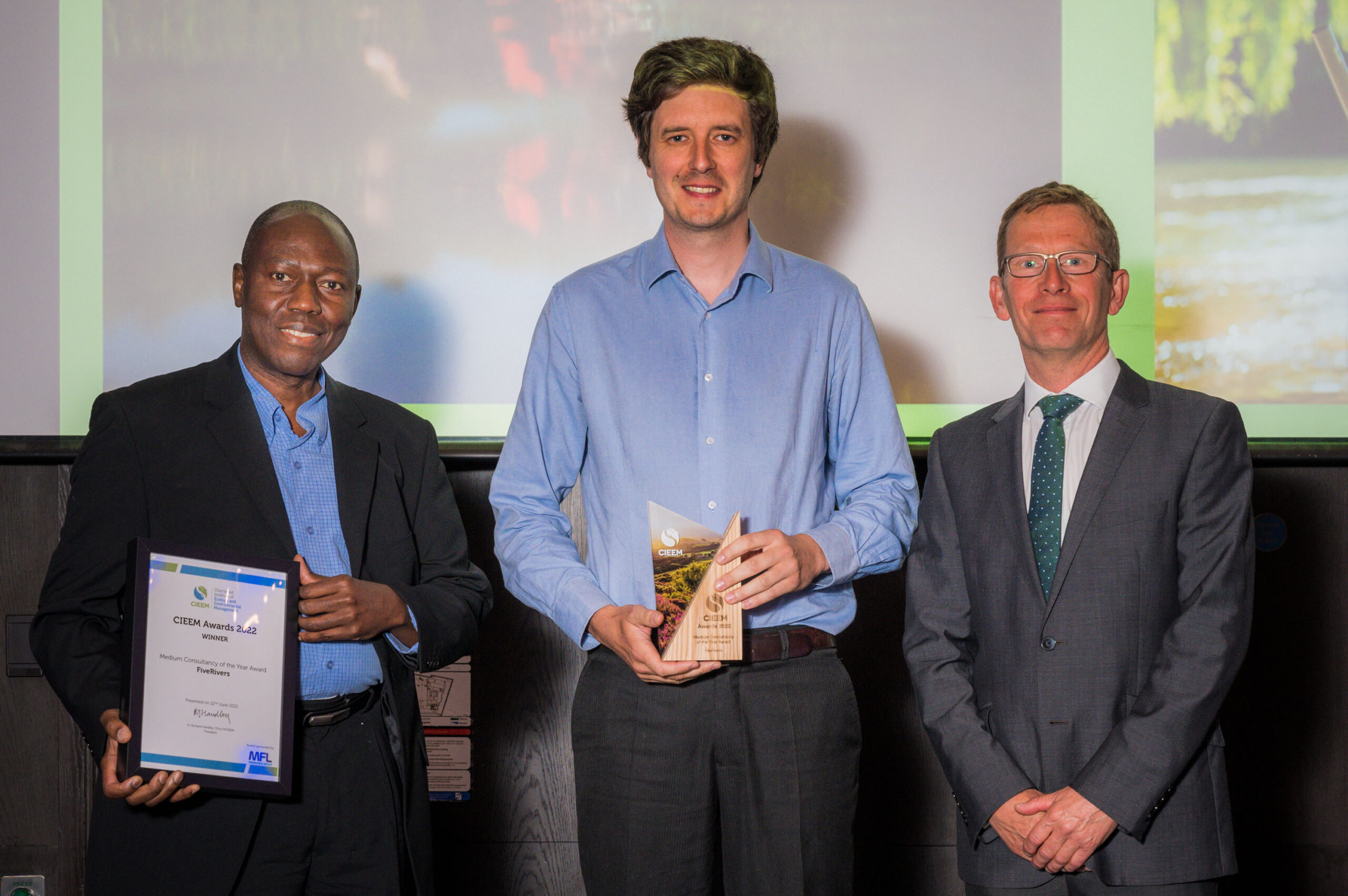 FiveRivers’ team members Jacob Dew and Kenneth Agyekum-Kwatiah with the 2022 CIEEM award